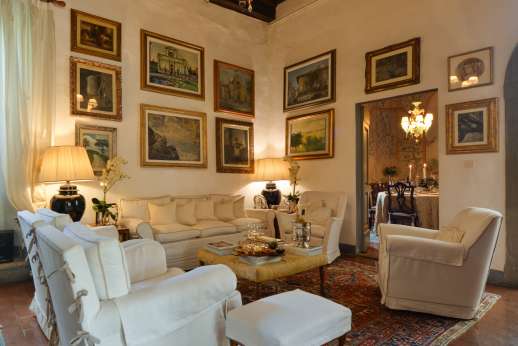 Villa San Martin - Two large sittings rooms each with high beamed ceilings and both leading out to the courtyard.