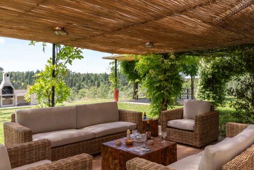 La Magione - Outside seating shaded by a pergola