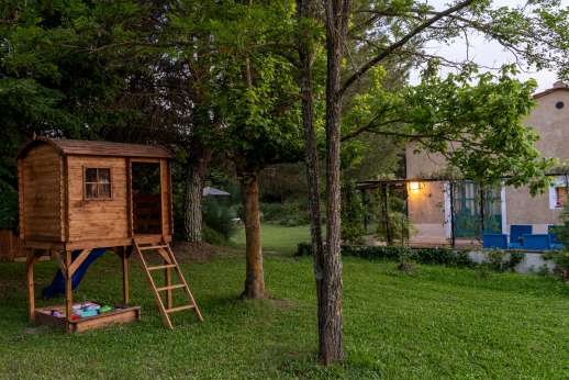 La Magione - Outside seating area with doors that lead through to the sitting room