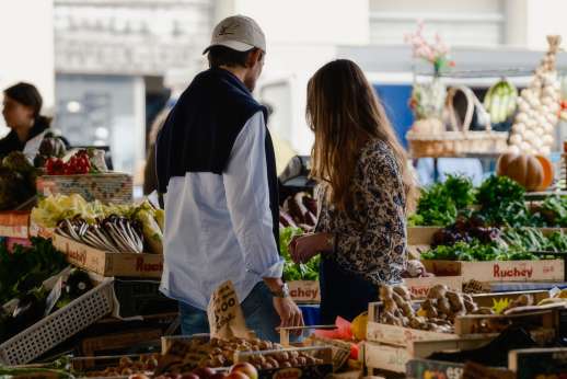 Guests exploring a traditional food market during a private Florence food tour