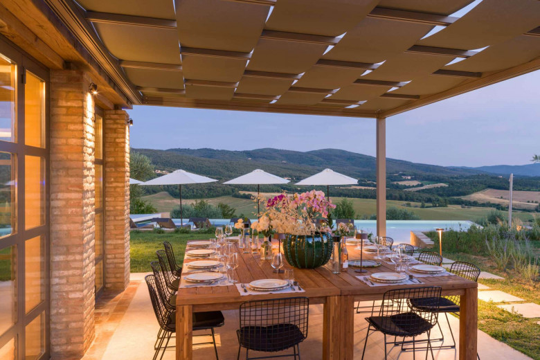 The pool house opens out onto two beautiful shaded terraces, including an outdoor dining area for 20 guests