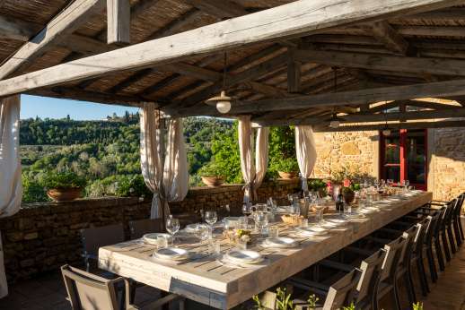 Podere Celli - A picture-perfect Tuscan farmhouse, Podere Celli and its old stone walls blend beautifully into the vine covered hills of western Chianti.