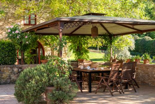 Podere Celli - A picture-perfect Tuscan farmhouse, Podere Celli and its old stone walls blend beautifully into the vine covered hills of western Chianti.