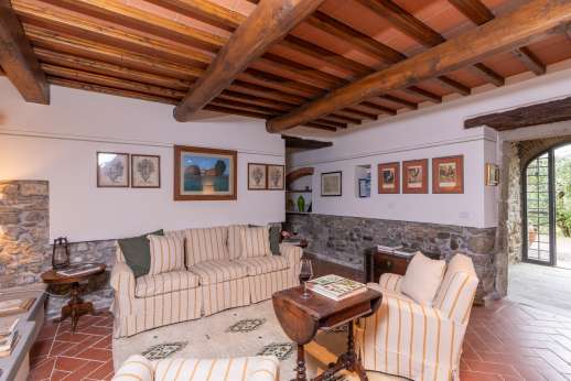 The Estate of Petroio with Staff and Cook - Large sitting room with fireplace.