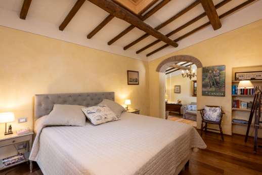 The Estate of Petroio with Staff and Cook - Air-conditioned double bedroom suite on the first floor of the guest house with an en suite bathroom.